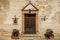 Beautiful view of the wooden door of an old building on the pavement