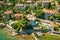 Beautiful villas near the coast of rocky beach in a small town Lovran, Croatia. Arial view of Lungomare sea walkway with