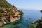 Beautiful villas on the shore of Portofino with clear green water of the Mediterranean sea, Portofino, Italy.