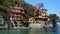 Beautiful villas on the shore of Portofino with clear green water of the Mediterranean sea, Portofino, Italy