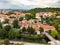 Beautiful Vilnius city panorama in autumn with orange and yellow foliage. Aerial evening view