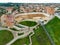 Beautiful Vilnius city panorama in autumn with orange and yellow foliage. Aerial evening view