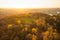 Beautiful Vilnius city panorama in autumn with orange and yellow foliage. Aerial evening view