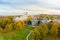Beautiful Vilnius city panorama in autumn with orange and yellow foliage. Aerial evening view
