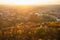 Beautiful Vilnius city panorama in autumn with orange and yellow foliage. Aerial evening view