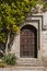 Beautiful vintage Victorian mansion entrance door surrounded by