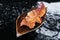 A Beautiful Vintage Wooden Boat With A Reddened Autumn Leaf Floats In A Puddle In The Rain In The Flooding And Storm