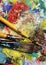 Beautiful vivid art palette and mix of paintbrushes