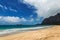 Beautiful Waimanalo beach with turquoise water and cloudy sky