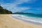 Beautiful Waimanalo beach with turquoise water and cloudy sky, Oahu coastline