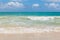 Beautiful Waimanalo beach with turquoise water and cloudy sky, Oahu coastline