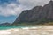 Beautiful Waimanalo beach with turquoise water and cloudy sky, Oahu coastline