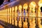 Beautiful walkway illuminated at night in Abu Dhabi Sheikh Zayed Grand Mosque, UAE