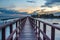 Beautiful of The walkway red wooden bridge in evening at Bang Khun Thian sea view, Bang Khun Thian, Bangkok