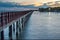 Beautiful of The walkway red wooden bridge in evening at Bang Khun Thian sea view, Bang Khun Thian, Bangkok