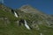 Beautiful waterfall in alpine nature