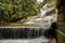 Beautiful waterfall called `Cascatinha Taunay` on green nature in the Atlantic Rainforest, Tijuca Forest National Park