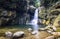 Beautiful waterfall, with clear waters, in Serra do Mar