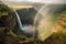 Beautiful waterfall creates a colourful rainbow. Amazing landscape