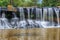 The beautiful waterfall in deep forest during raining season at Tat Ton National Park