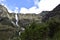 A beautiful waterfall falls from a high mountain, on the way to Lagoon 69. Huascaran National Park in the Sands of Peru