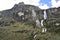 A beautiful waterfall falls from a high mountain, on the way to Lagoon 69. Huascaran National Park in the Sands of Peru