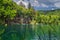 Beautiful waterfall illuminated by sunlight in Plitvice Lakes