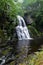 Beautiful waterfall in lush vegetation in Pennsylvania