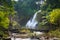 beautiful waterfall in northern Thailand, name Pha dok siew waterfall in Doi intanon national park with bamboo bridge