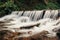 Beautiful waterfall on river in forest in mountains. cascades ri