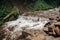 Beautiful waterfall on river in forest in mountains. cascades ri