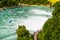 A beautiful waterfall on the river Rhine in the city Neuhausen am Rheinfall in northern Switzerland. The Rhine Falls is the larges