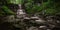 Beautiful Waterfall Shot with Long Exposure - Green Forest Foliage