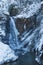 Beautiful waterfall in snowy mountains. Black and white photo. ZhenetsÊ¹kyy Huk