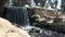 Beautiful waterfall and stream in an urban park