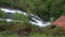 Beautiful waterfall among the thick vegetation, Toques