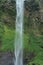 Beautiful waterfall in tropical rainforest, Indonesia waterfall in Cimahi. Green background walpaper