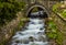 Beautiful waterfall under a bridge