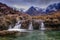 Beautiful waterfalls Fairy Pools under the snowy mountains