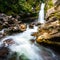 Beautiful waterfalls in the green nature, Wainui Falls, Abel Tasman, New Zealand