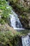 The beautiful waterfalls, rapids and mountain streams in the tropical forest in Yanoda Park,  Sanya city. Hainan, China