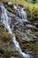 The beautiful waterfalls, rapids and mountain streams in the tropical forest in Yanoda Park,  Sanya city. Hainan, China