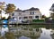 Beautiful waterfront home with a boat by the bay near Rehoboth Beach, Delaware, U.S.A