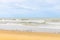 Beautiful wave soft blue breaking empty beach daytime. clean sandy surfing Brunei. Landscape water pattern sunset. sea wave