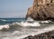 Beautiful waves roll to the beach with views to the coast