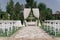 Beautiful wedding archway. Arch decorated with biege cloth and flowers