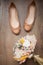 Beautiful wedding bouquet of dry flowers and ballet shoes.