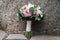 Beautiful wedding bouquet of white and pink peony and roses.