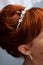 Beautiful wedding diadem, wedding hairstyle on red hair