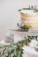 Beautiful wedding round cake with floral decorations.